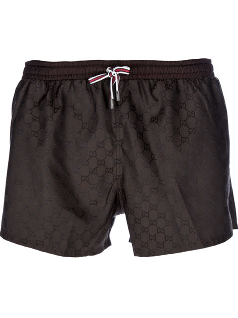 farfetch gucci swim shorts.